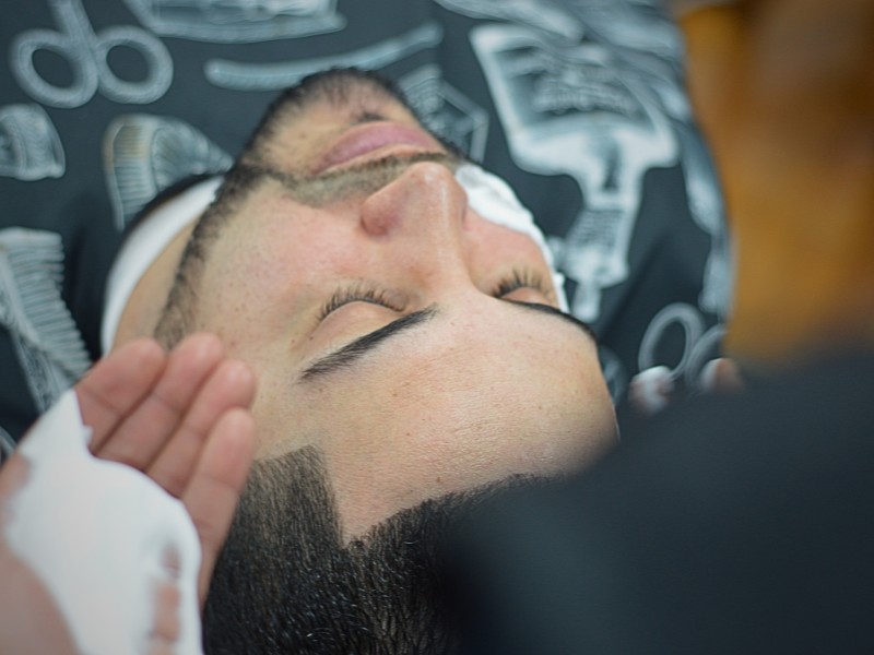 Haircut and clarifying steam facial