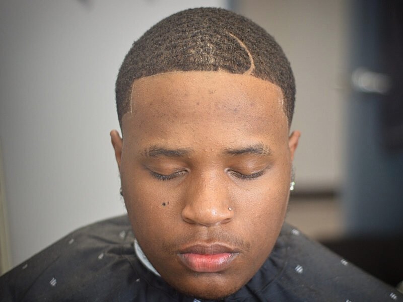 Hair design with part line