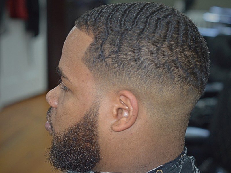 Men's haircut with fade and beard